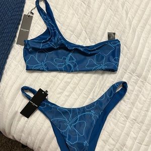Chelsea reversible top (Cayman)S. Cove reversible bottom (Cayman/Midnight Blue)M